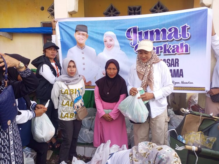 Pasangan MDR-Bella Bantu Pedagang dan Dhuafa Lewat Aksi Sosial di Namlea