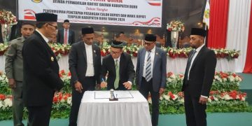 Paripurna DPRD Buru Tetapkan Ikram–Sudarmo Sebagai Bupati dan Wabup Terpilih